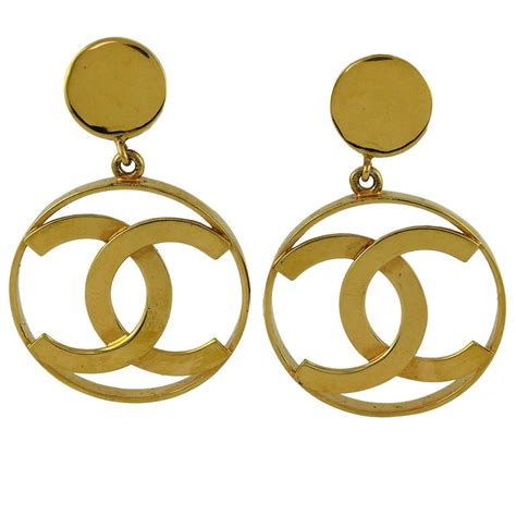 gold Chanel logo hoop earrings